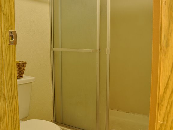 Master bathroom with detached sink and vanity room