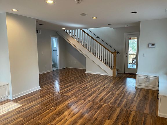 Entry with stairs to second floor and porch entry and bath entry