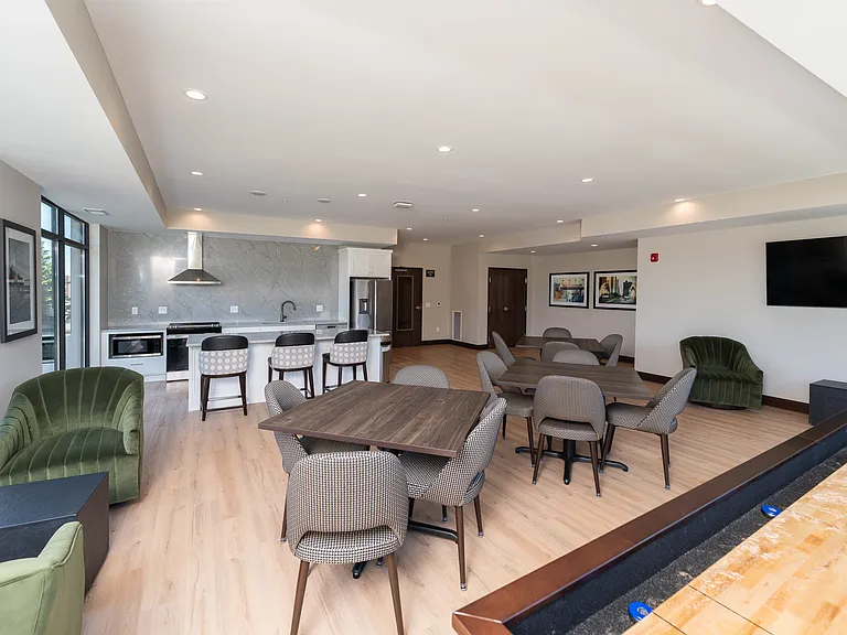 A relaxed community area built for conversation, games, and everyday connection.