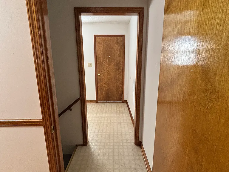 Doorway to laundry room and basement