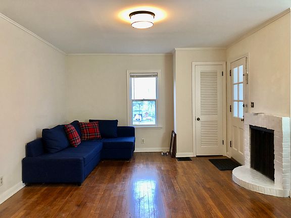 Living and dining room is 15 x 17.5. Has fireplace, hardwood floors and access to enclosed porch. Windows have screens and storms.