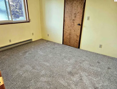 upstairs bedroom 2 with balcony