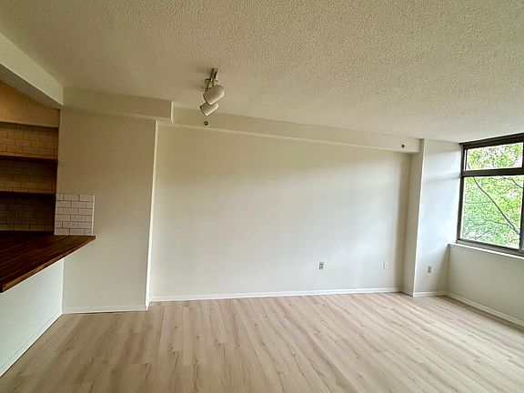 View of Living Room and Dining Area from Bedroom