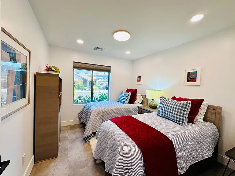 Guest Bedroom 3: 
Two Twin beds, ideal for kids, singles, or friends traveling together.