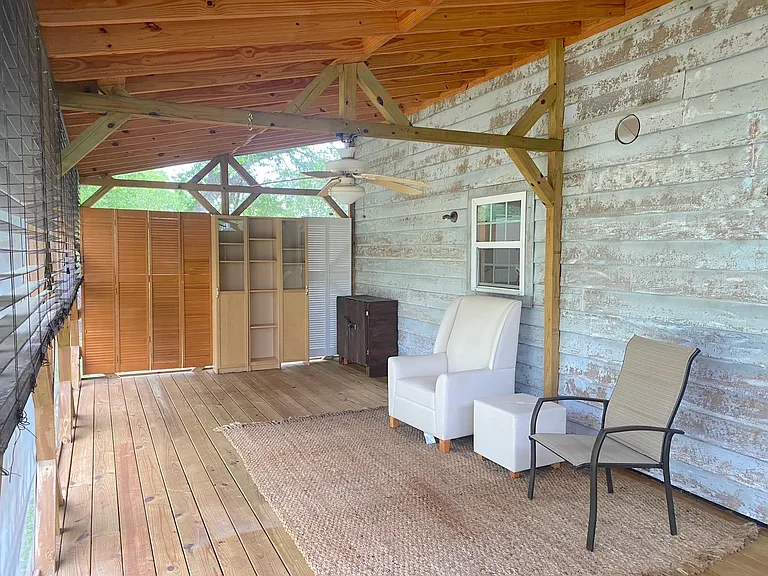 Screened-in backyard deck.