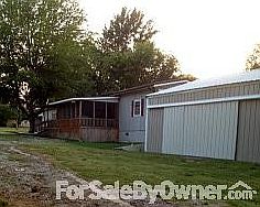 Mobile Home + Add On Garage / Shop
						:
						Mobile home on foundation. 24 x 30 metal building plus a small shop.