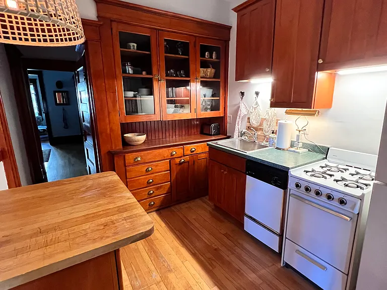The well appointed kitchen with butcher block island.