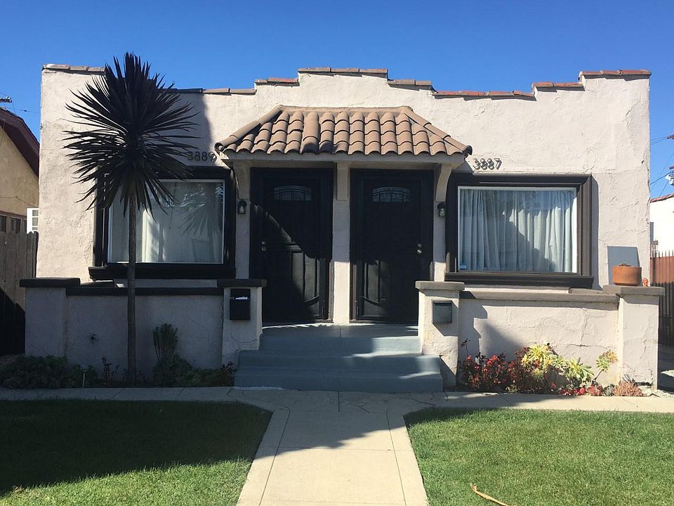 Left-side of this lovely Spanish duplex