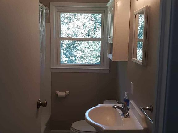 Bathroom with tub/shower combo.