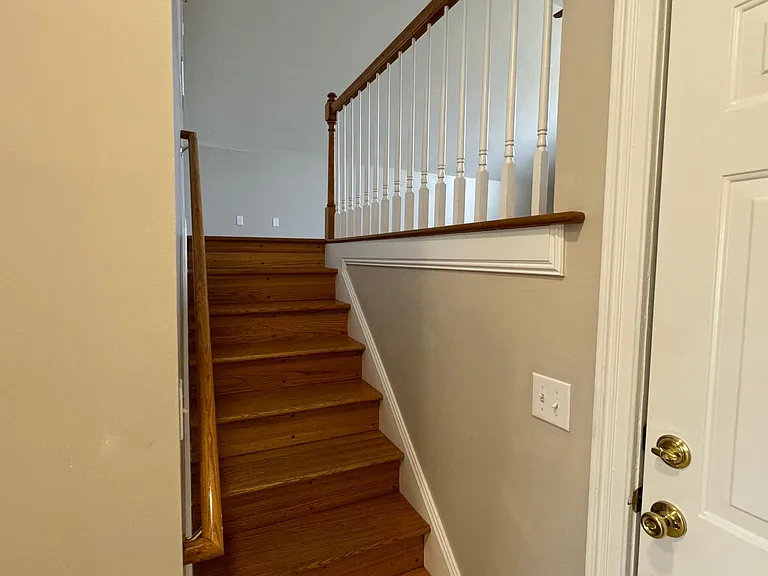 Stairs to the bonus room - Door leads to garage