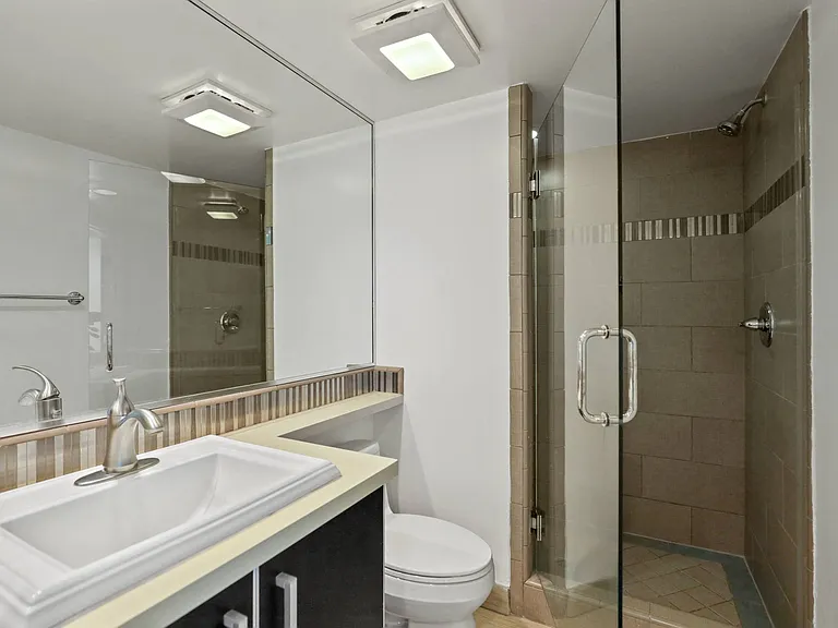 Bathroom with Stand-Up Shower with Glass Door
