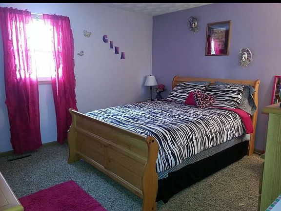 Bedroom with half bathroom