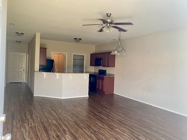 Kitchen, dining and living area.