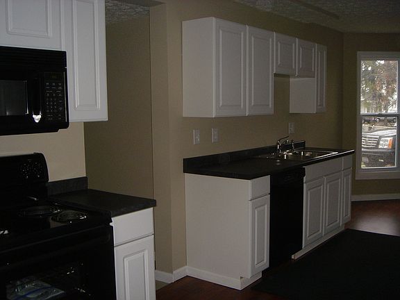 Alternate view of kitchen.