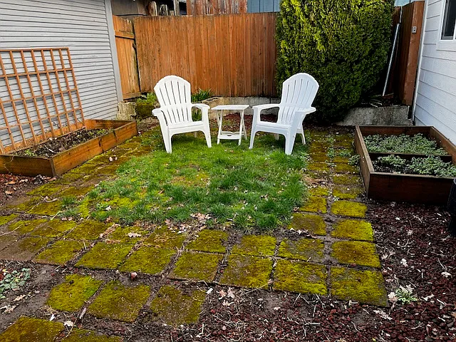 Private courtyard with garden beds ready for spring planting!