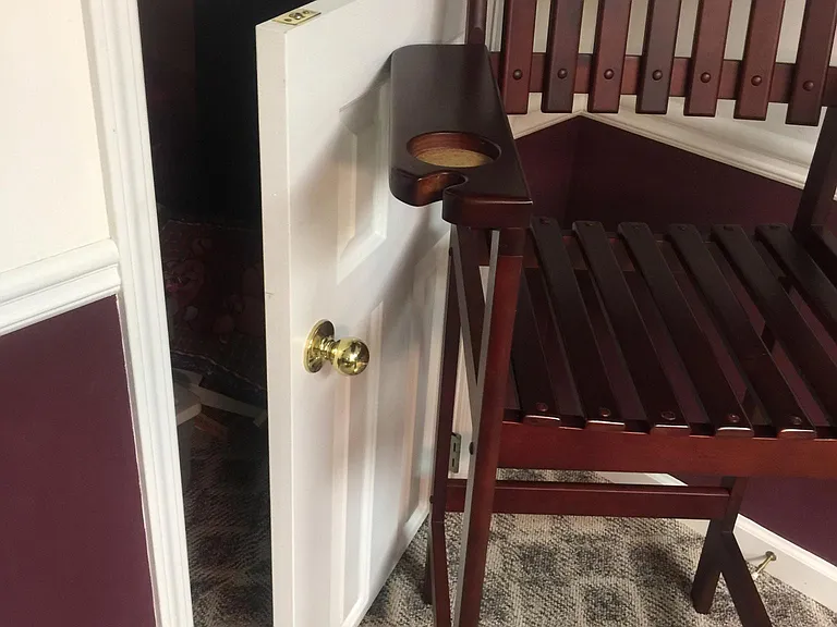 Access Door to storage area beneath stairs - lower entertainment level