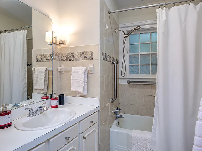 Downstairs bath with tub and shower.