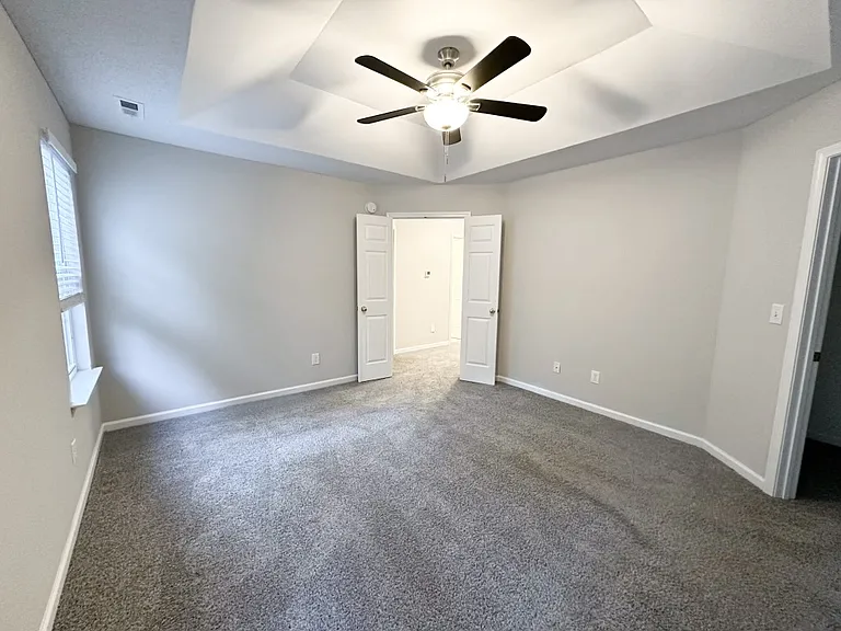 Master bedroom with French door.
