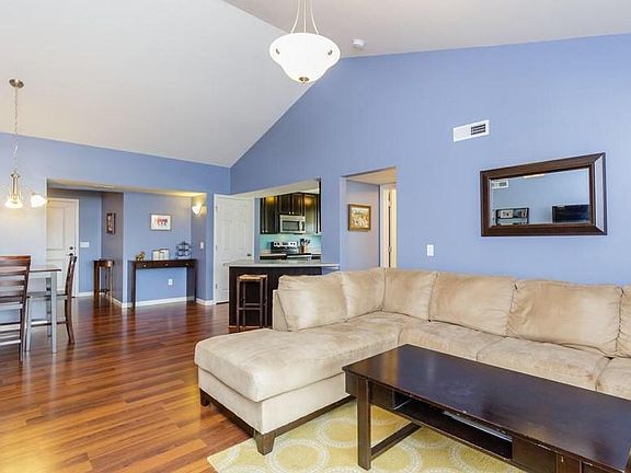 Open floor plan w/ vaulted ceilings - kitchen, family room,