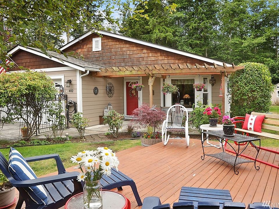 Welcome to 402 Sycamore Rd!  This charming home features outdoor spaces in both front and back for your relaxation and entertainment.