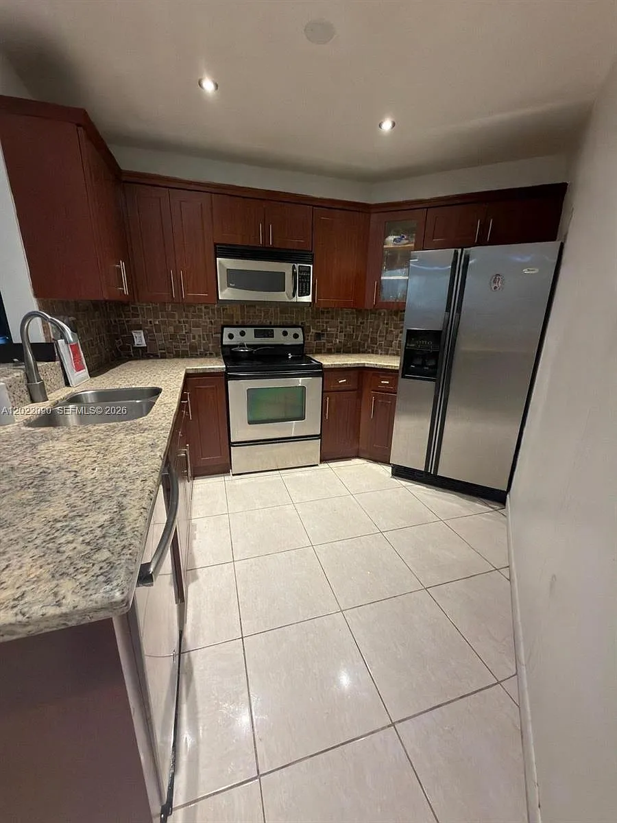 Building Photo - 9443 Fontainebleau Blvd #209