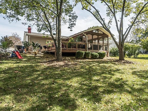 Look at the back of this house! Outdoor Living Space galore!