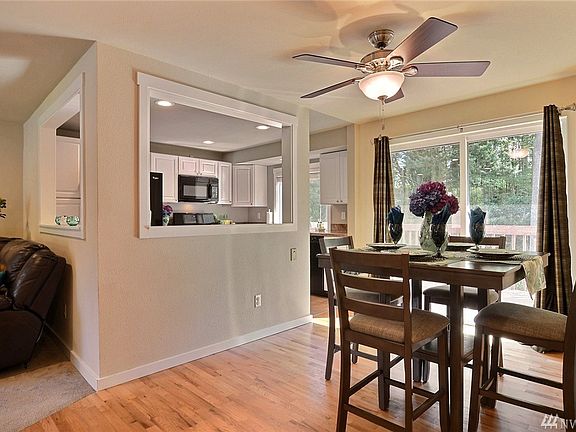 Never miss what is going on in the other rooms when your kitchen is centrally located!