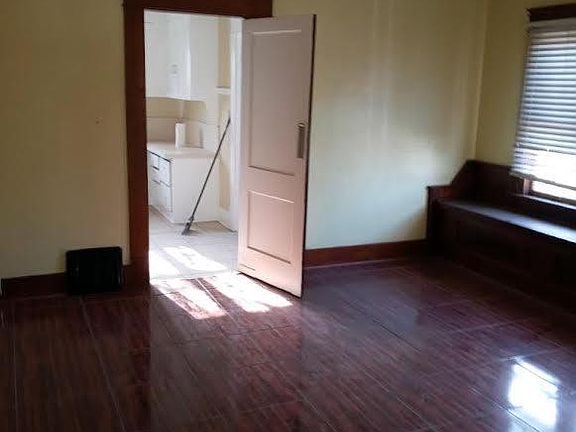 Dining room showing Victorian style bench on south side over windows.