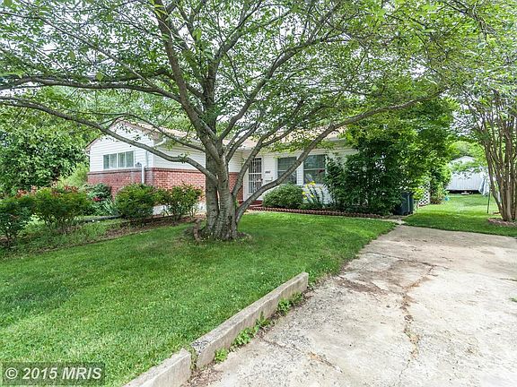 Front View of Home with Paved Driveway