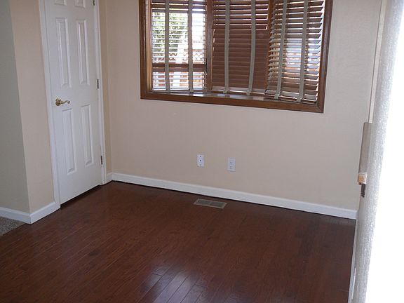 large dining area with wood floors