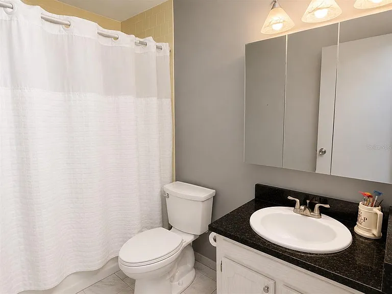 1706 Belleair Forest Dr #244 — Photo 18