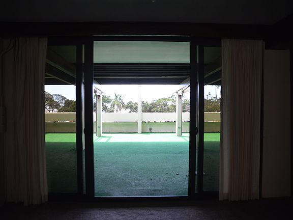 View of HUGE 1,469 SF patio from living room. Great for ente