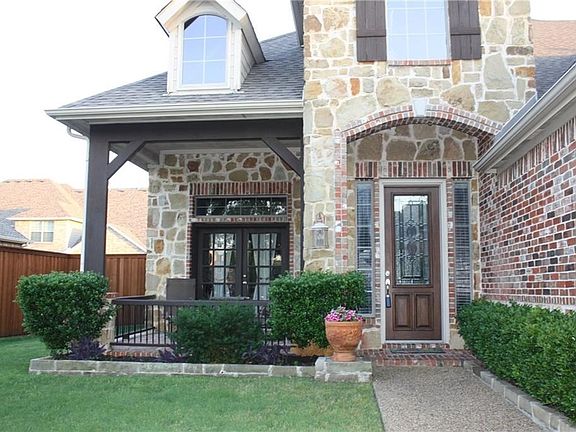 You can enjoy sitting on the front porch.  The French doors open into the formal living room.