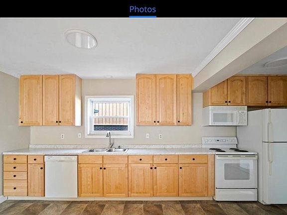 newly renovated kitchen 42" maple cabs