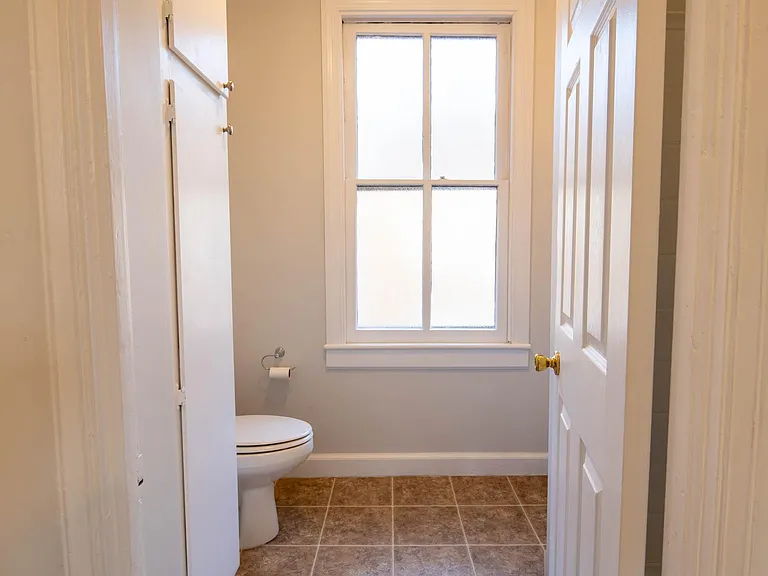 Bathroom A, shower and sink to the right
