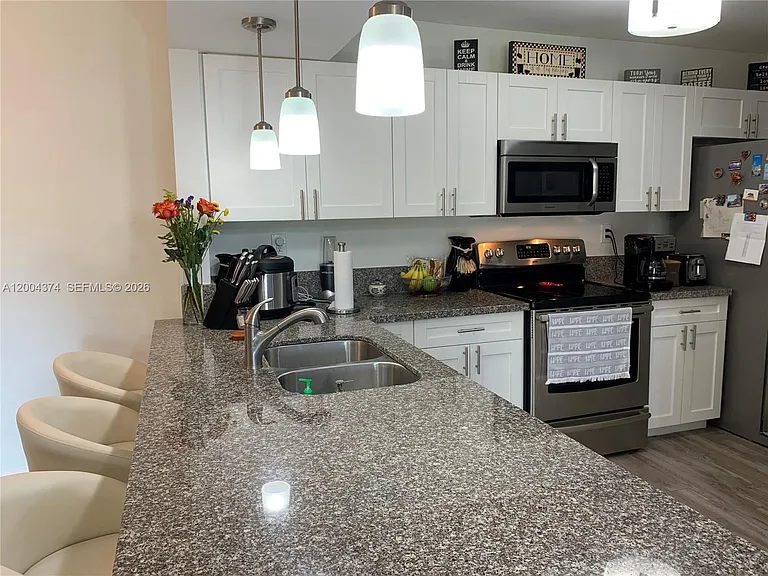 8660 SW 212th St #305 — Photo 3