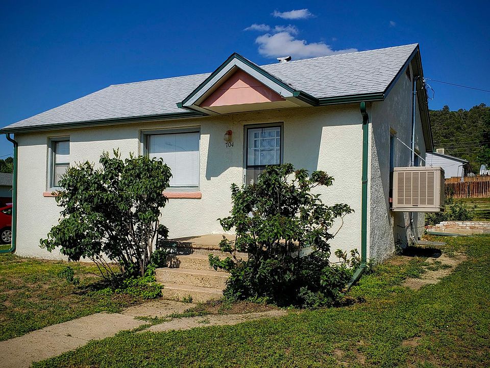 Front of House, showing brand new window evaporative cooler.
