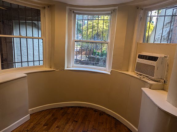 Bay windows let in lots of natural light. Perfect space to work or entertain.