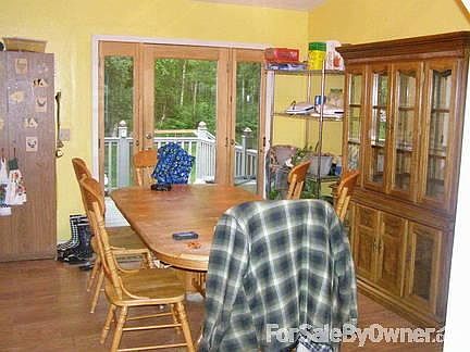 Dining Room
						:
						Here's the dining room and the exit to the back deck