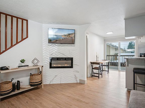 Electric fireplace, larger tv available