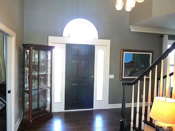 Inside foyer w/winding stair