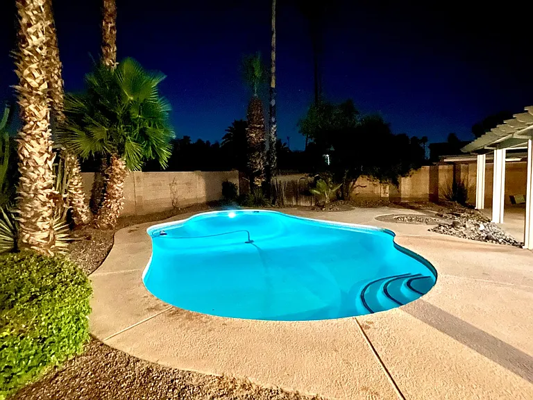 wonderful lighting in this beautiful backyard