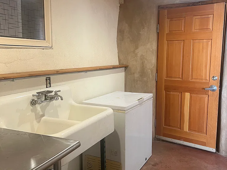 Laundry room with utility sink