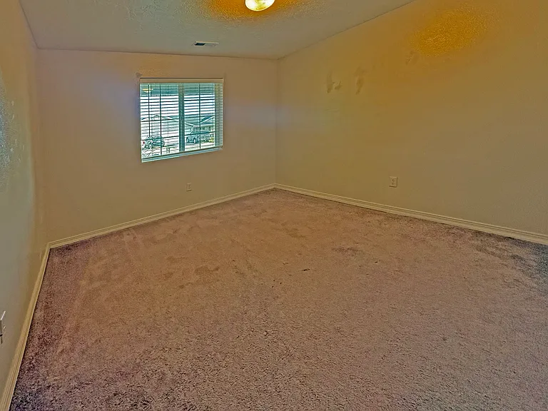 3rd Bedroom with window overlooking the street