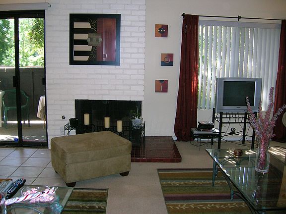 Fireplace in Living Room and Patio off Dining Room