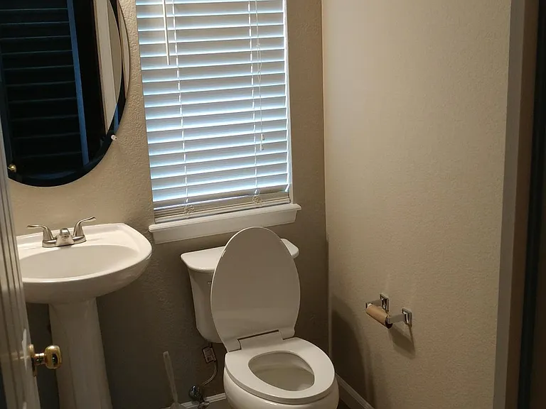 Powder bathroom access in the office.