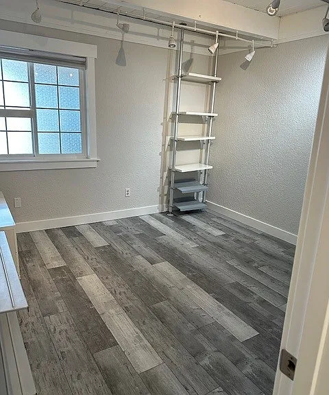 Bedroom 2. Shelves can be taken down if preferred.