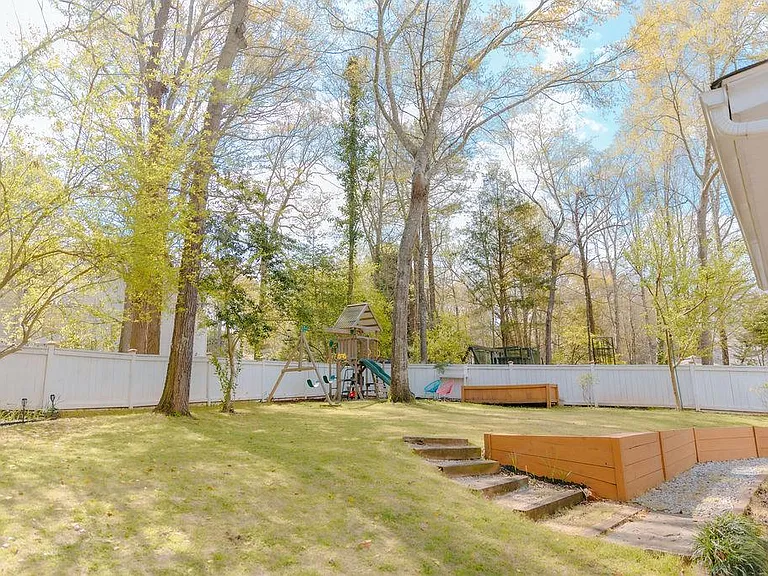 backyard (swing set stays)