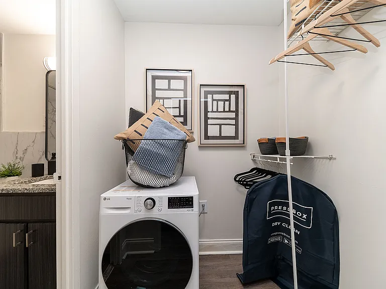 Laundry area with built-in shelving