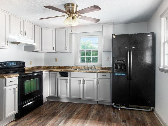 The black appliances were just replaced with stainless steel